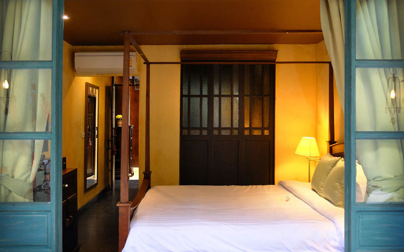 Queen-size bed and hallway